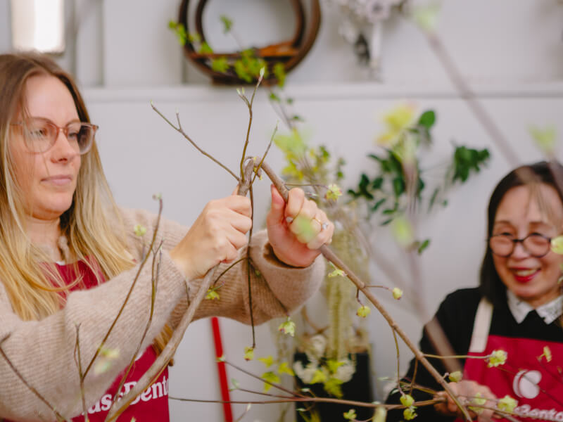 Students at an ikebana flower arranging class